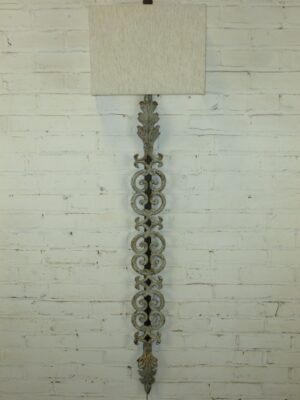 Leaf scroll custom iron wall sconce with a gray, distressed finish. Paired with our half rectangle linen lamp shade.