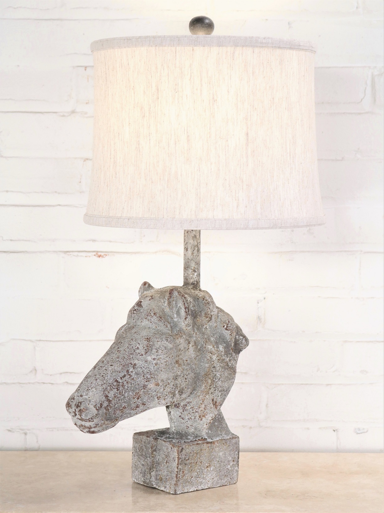 Horse head custom iron table lamp with a 12 inch linen drum lamp shade.