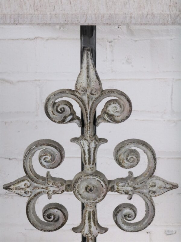Cross custom iron table lamp with a white, distressed finish