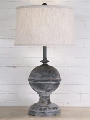 Finial custom iron table lamp with a gray, distressed finish and paired with a 15 inch linen drum lamp shade.