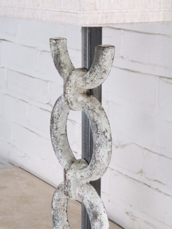 Rings custom iron table lamp with a white, distressed finish.