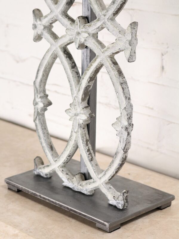 Cathedral custom iron table lamp with a white, distressed finish and a pewter base.