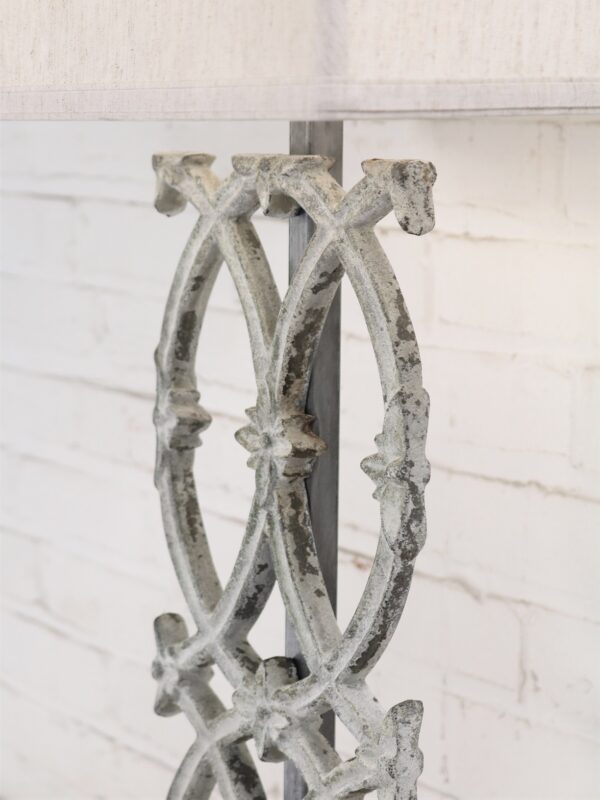Cathedral custom iron table lamp with a white, distressed finish.