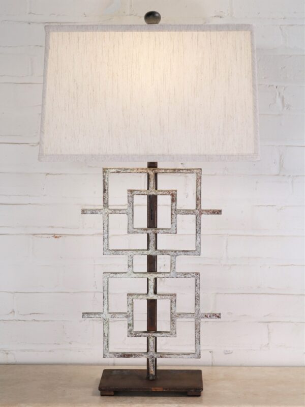 Squares custom iron table lamp with a white, distressed finish and a dark iron base. Paired with a 16 inch rectangle linen lamp shade.