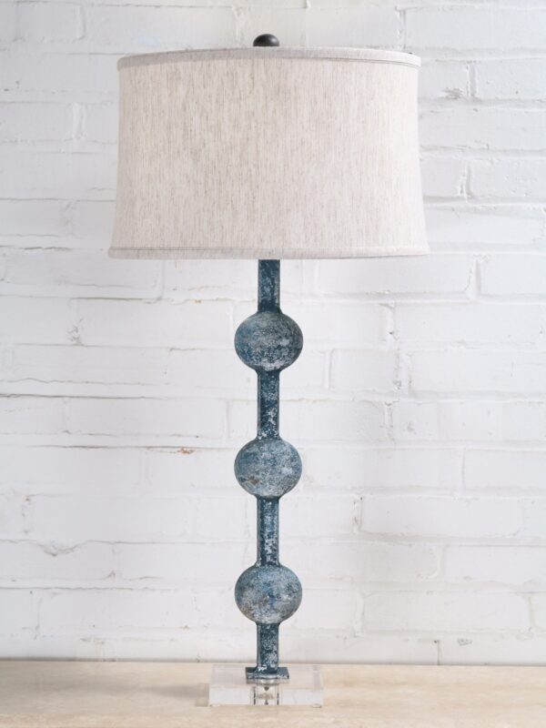 33 inch tall spheres custom iron table lamp with a blue, distressed finish and an acrylic base. Paired with a 15 inch drum linen lamp shade.