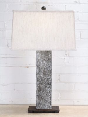 30 inch tall rectangle post custom iron table lamp with a gray, distressed finish and a dark iron base. Paired with a 16 inch rectangle linen lamp shade.