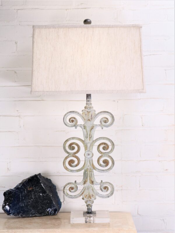 Fleur Scroll custom iron table lamp with a white, distressed finish and an acrylic base. Paired with a 17 inch rectangle linen lamp shade.