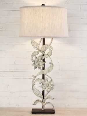 Sunflower custom iron table lamp with a white, distressed finish and a dark iron base. Paired with a 17 inch linen drum lamp shade.