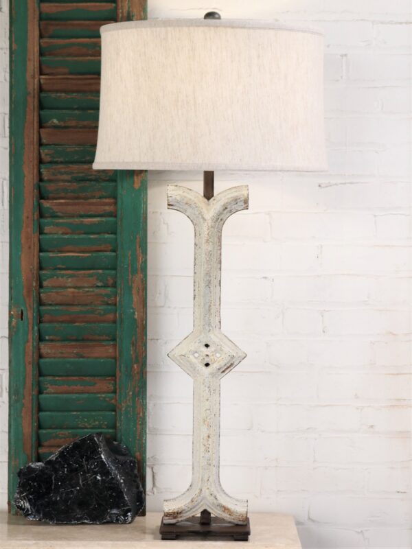 Diamond column custom iron table lamp with a white, distressed finish and a dark iron base. Paired with a 17 inch linen drum lamp shade.