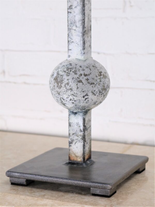 Sphere custom iron table lamp with a white, distressed finish and a pewter base.