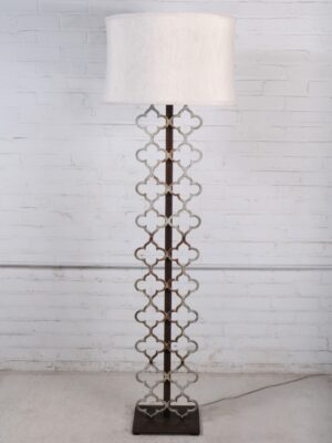 Ferro Designs LLC Quatrefoil custom iron floor lamp with a white, distressed finish and a dark iron base. Paired with a 19 inch linen drum lamp shade.