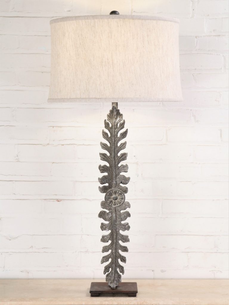 Large leaf custom iron table lamp with a gray, distressed finish and a dark iron base. Paired with a 17 inch linen drum lamp shade.