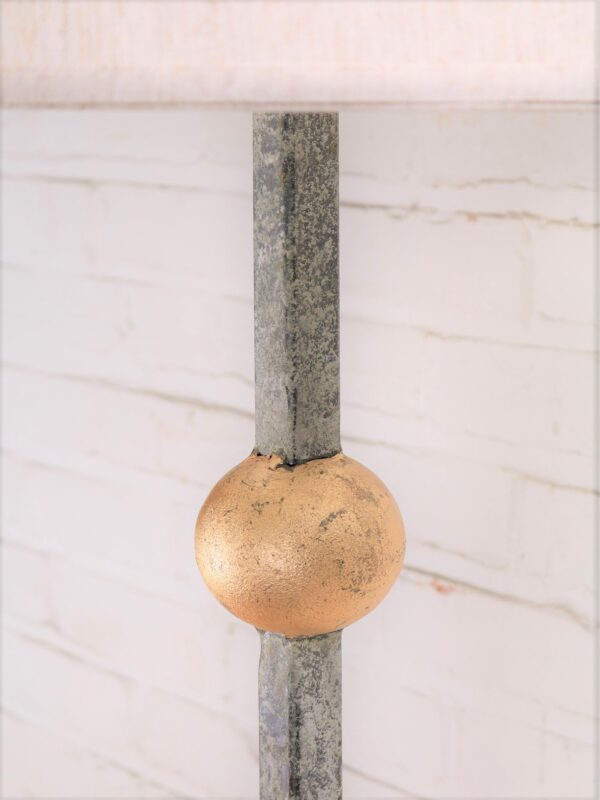 Gold leaf ball custom iron floor lamp with a white, distressed finish.
